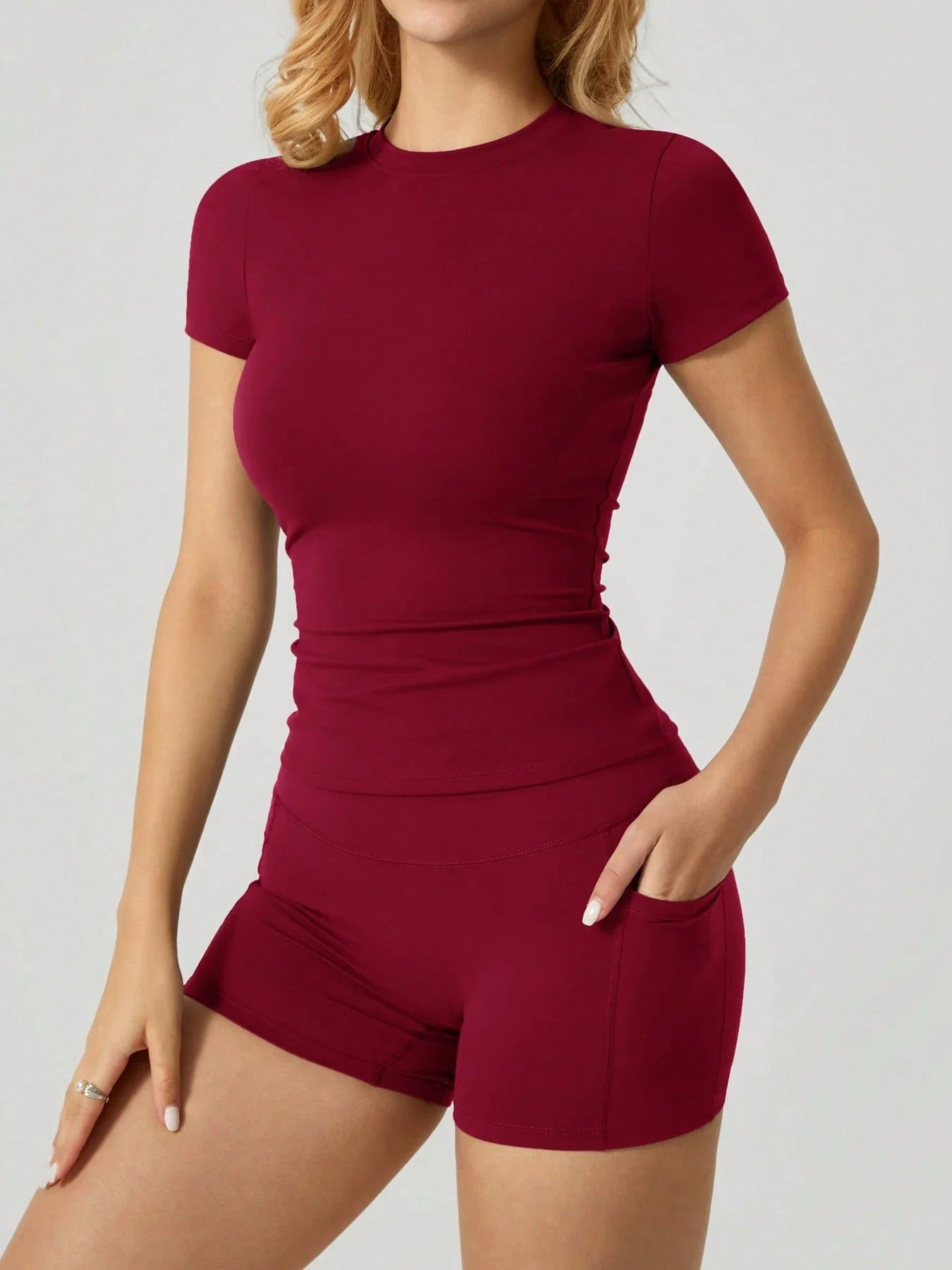 Conjunto Fitness com short Duplo com Bolso